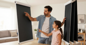 father and daughter comparing blackout shades
