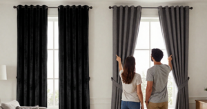 couple looking at blackout blinds displays