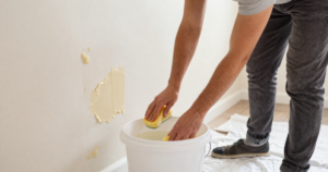 removing wallpaper glue from wall